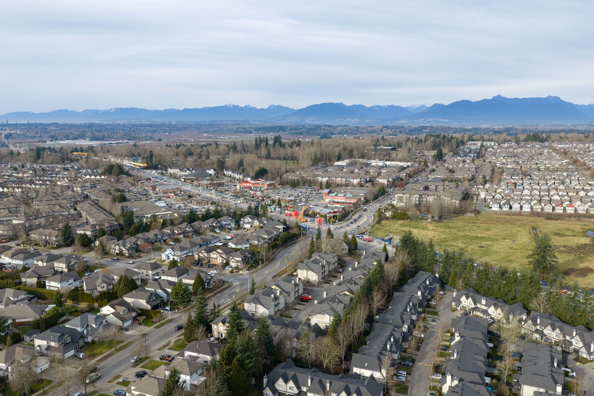 Drone view over Surrey toward the mountains