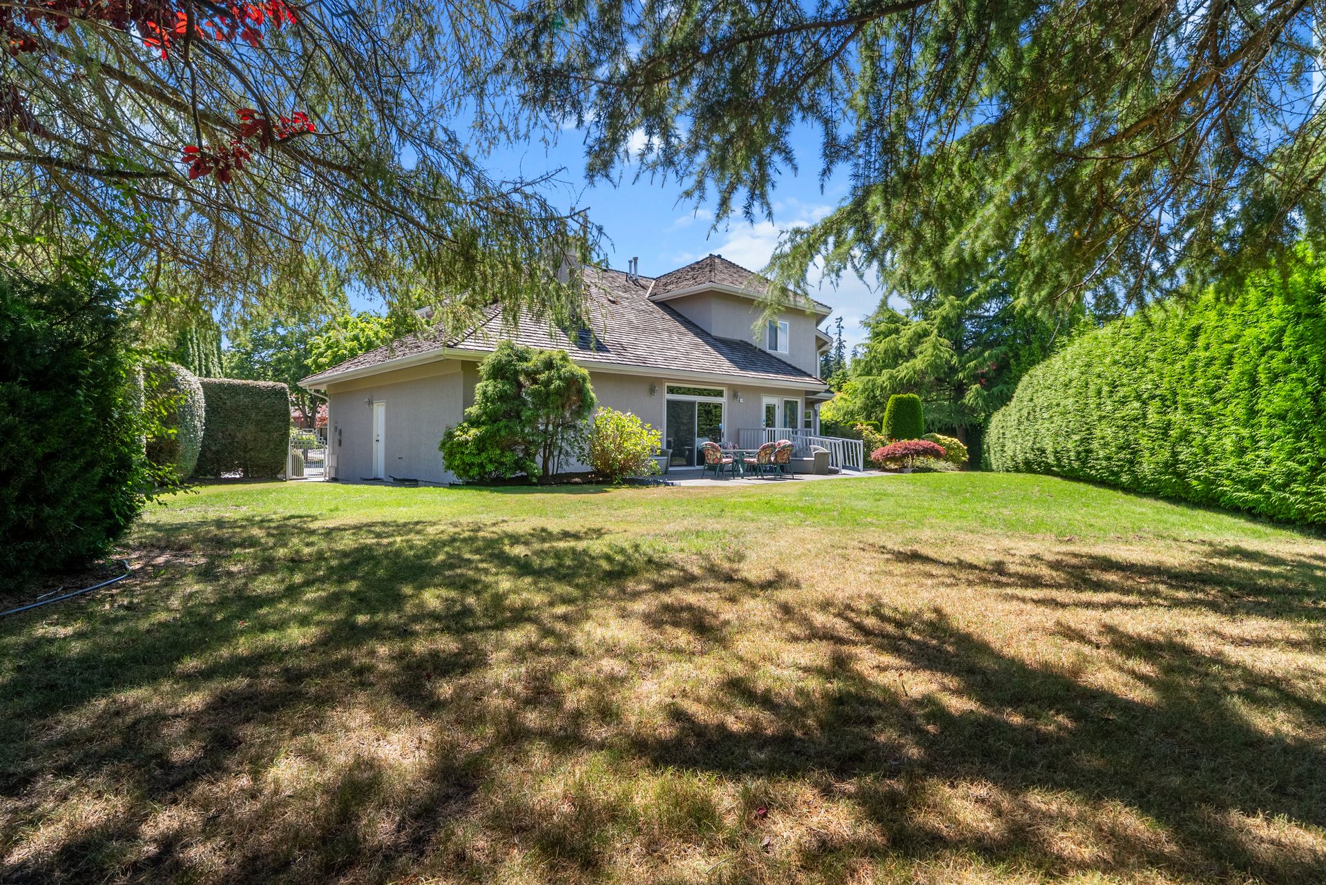 Private backyard with mature trees