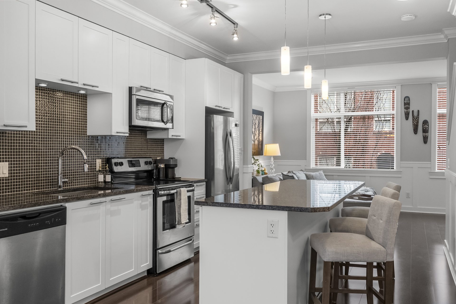 Modern kitchen with an island and pendant lights